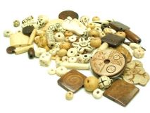Assorted Colors, Sizes and Shapes of Buffalo Bone Beads by the LB apx 350 pieces 